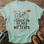 I Check On My Bike More Than My Texts Tee — bay